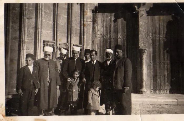 Photo of a Izzet Bey and his sons amongst other people