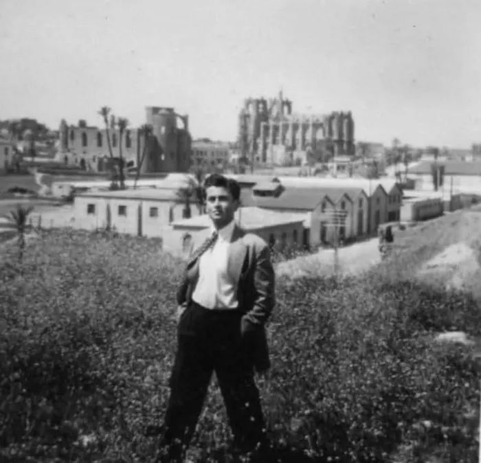 Photo of Mustafa standing in a field