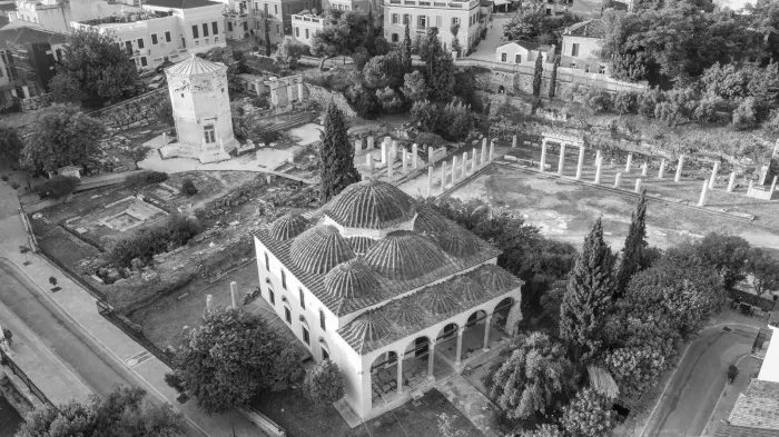 Black and white photo of the Fethiye Mosuque and the Tower of the Winds