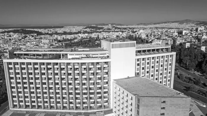 Black and white photo of a wide building