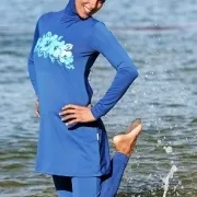 Woman wearing modest swimwear