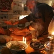 A Malay shaman performing traditional medicine on a patient
