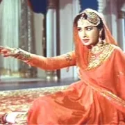 Woman wearing orange Asian traditional attire