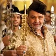 a man holding a golden spear