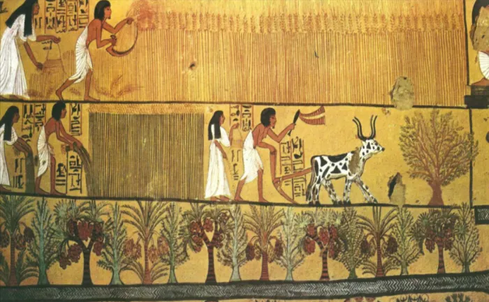 Ancient Egyptian painting showing people and animals in a desert landscape