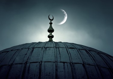 Dome of an old mosque with a crescent