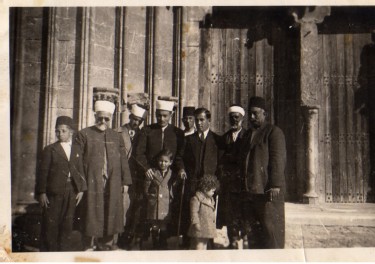 Izzet Bey in his suit and his sons Naim and Mustafa 