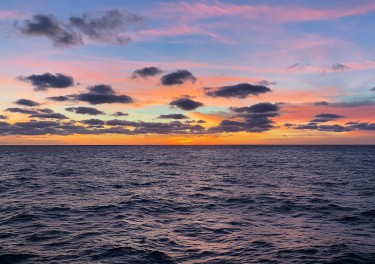 sunset over the Atlantic Ocean.