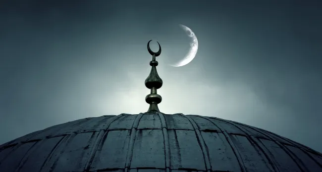 Dome of an old mosque with a crescent